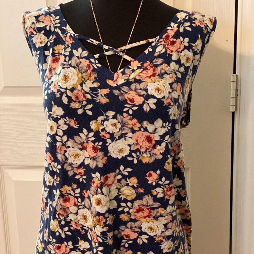 Super cute floral cross front tank
